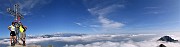 64 Alla croce di vetta del Grignone-Rif. Brioschi (2410 m)...il cielo e blu sopra le nuvole !